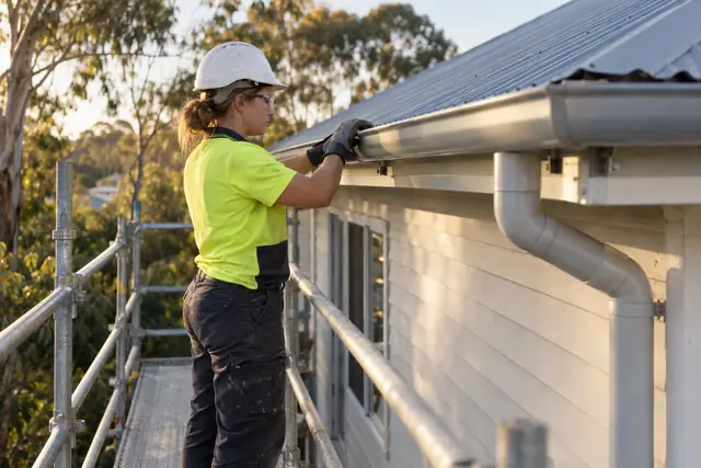 Roofing & guttering: tile roof leak investigation and repair in progress